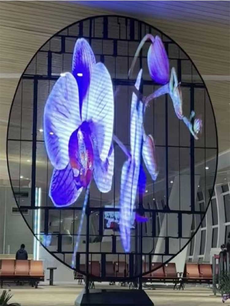 Custom circular transparent LED display in an architectural space