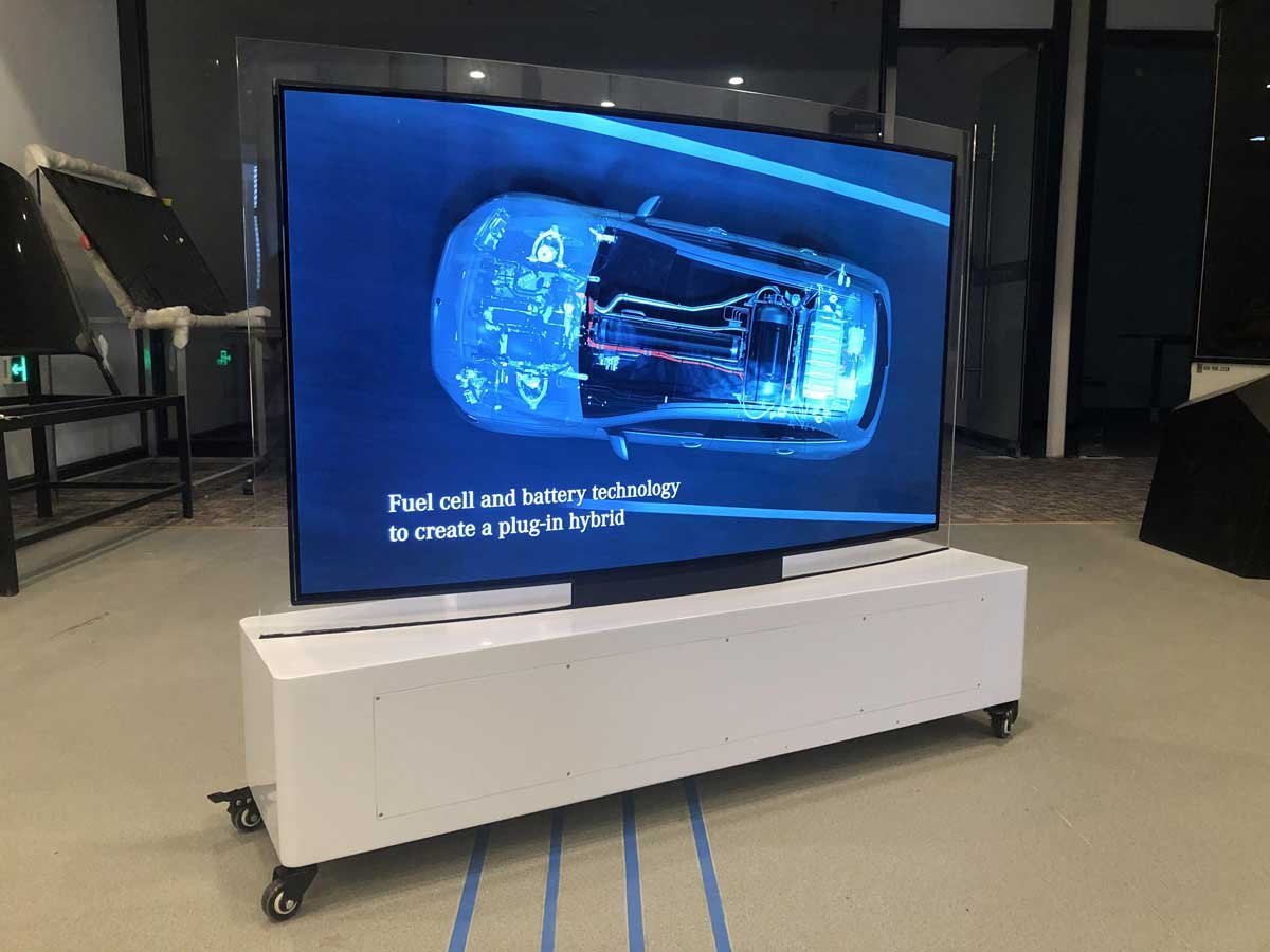 55-inch curved flexible OLED display installed in an automotive showroom