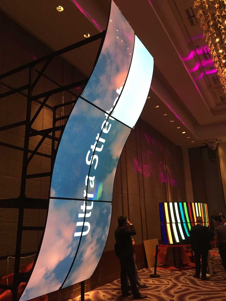 Six 65-inch flexible OLED displays forming a 2 by 3 S-shaped video wall