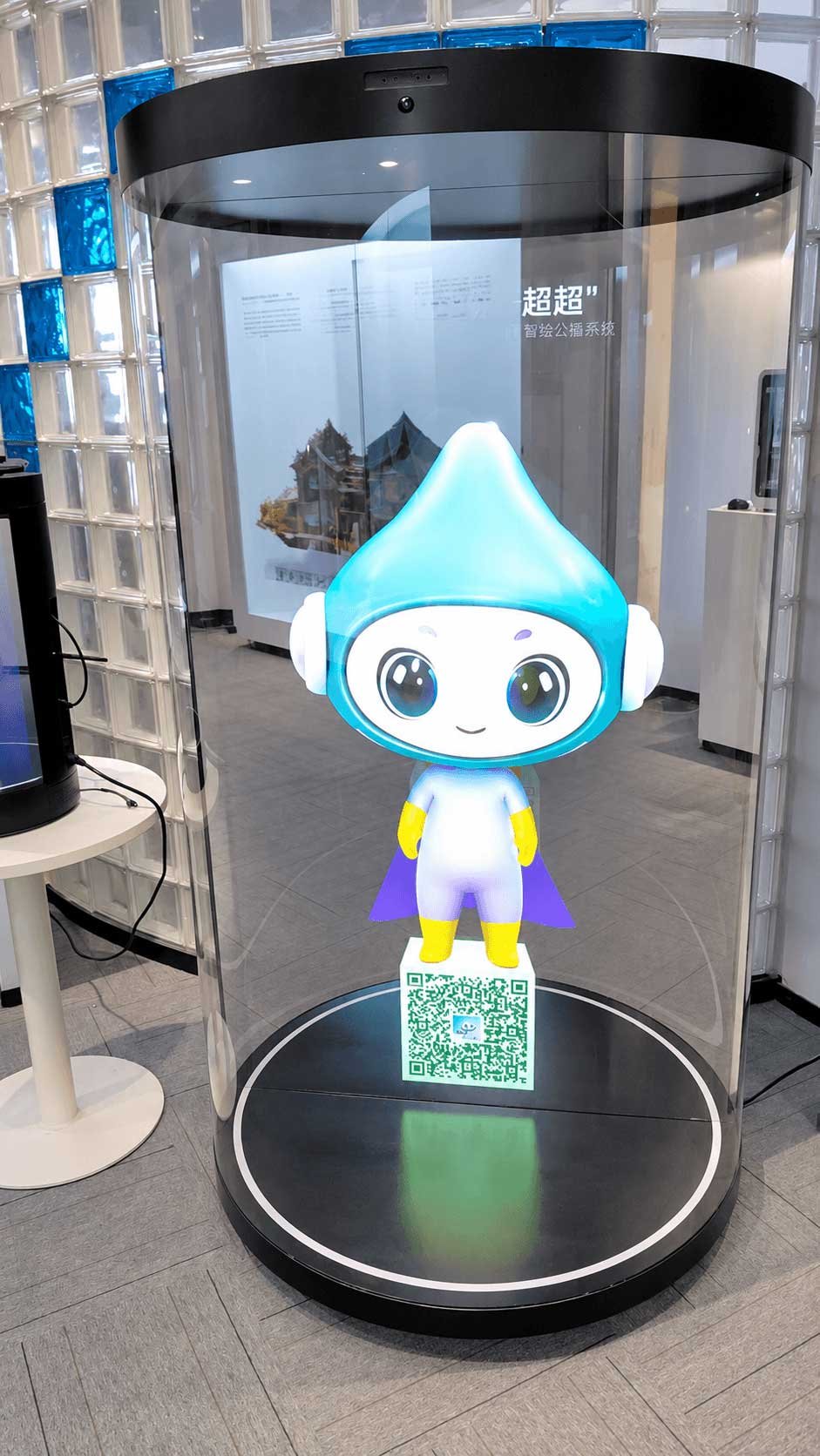 Animated digital human presentation on a 75-inch holographic cylinder display