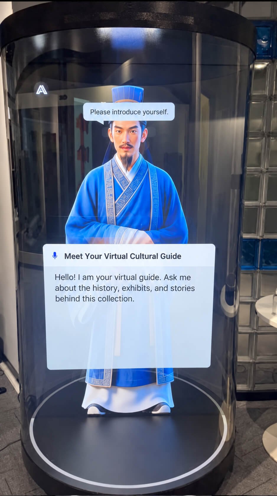 75-inch holographic cylinder display presenting a virtual cultural guide