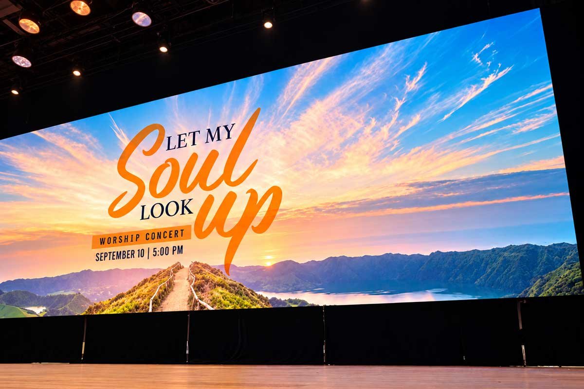 Indoor event stage with a large LED backdrop