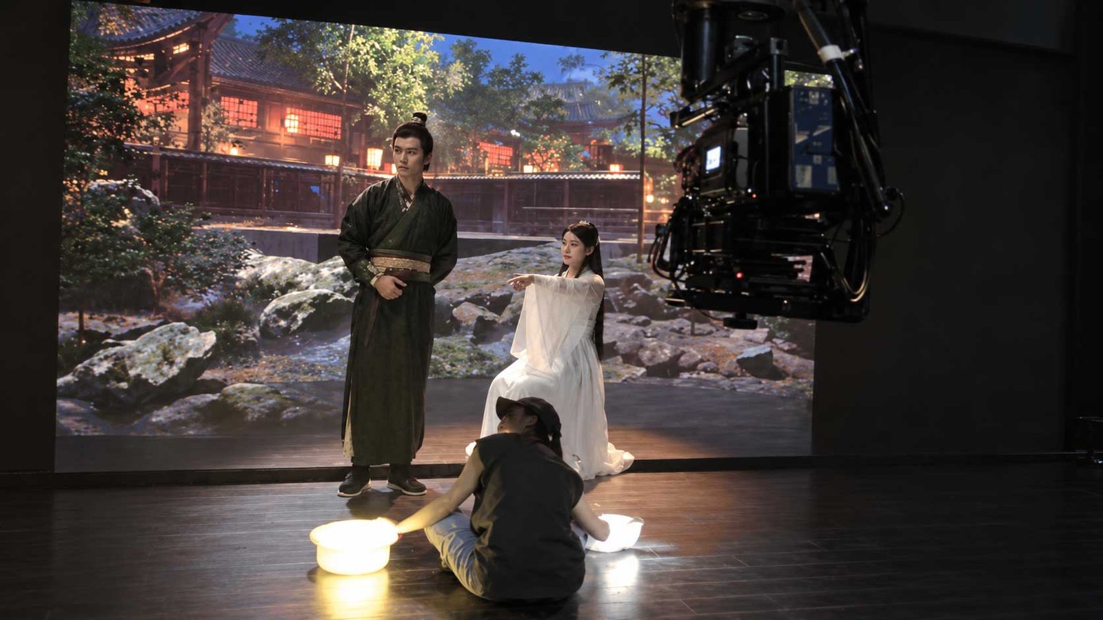 Camera and crew on an XR LED virtual production film set